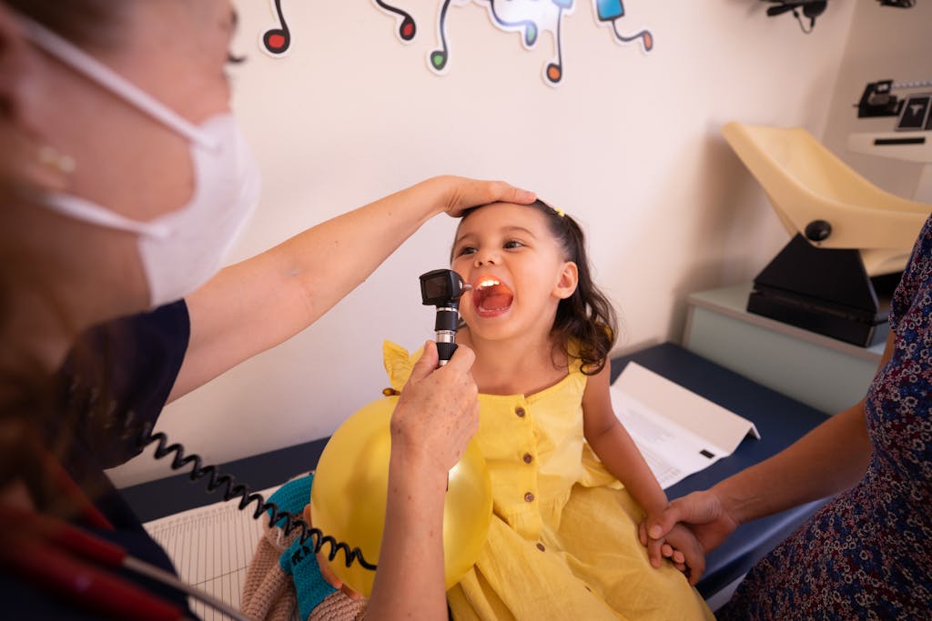 A Physician Examining Her Patient